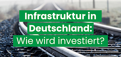 Investitionen Infrastruktur Deutschland: Schriftzug vor Bahnschienen